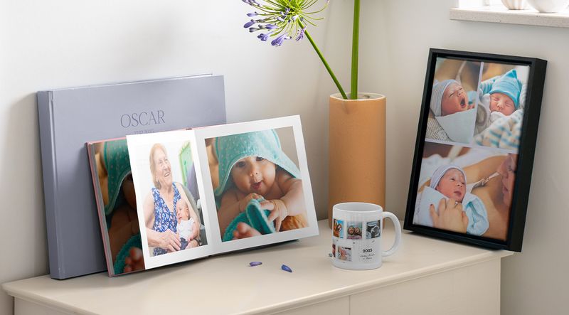 Personalisierte Babygeschenke mit Fotobuch und Wandbild